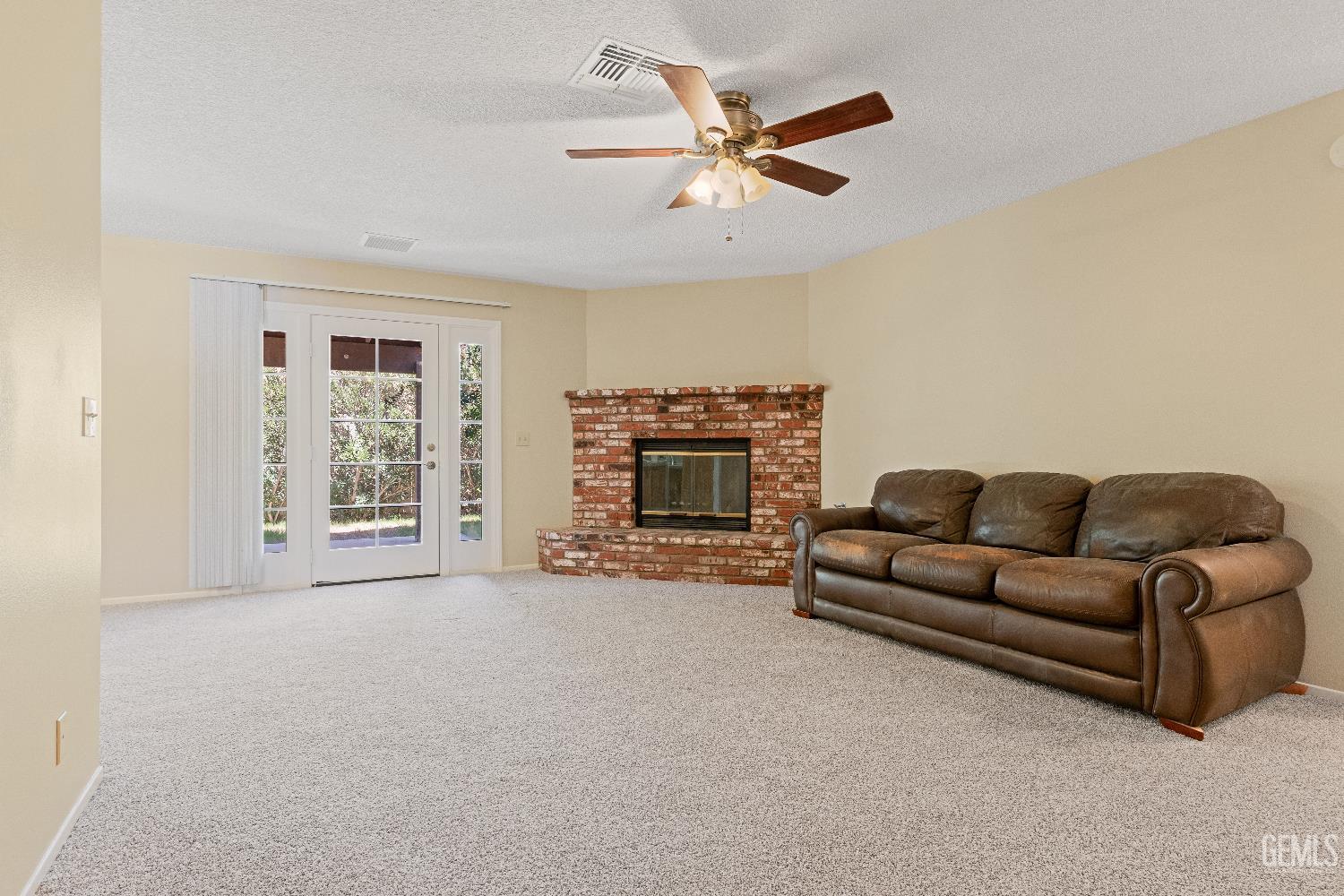 Undisclosed Address Ridgecrest, CA 93555 - Photo 7 of 25 a living room with furniture and a fireplace