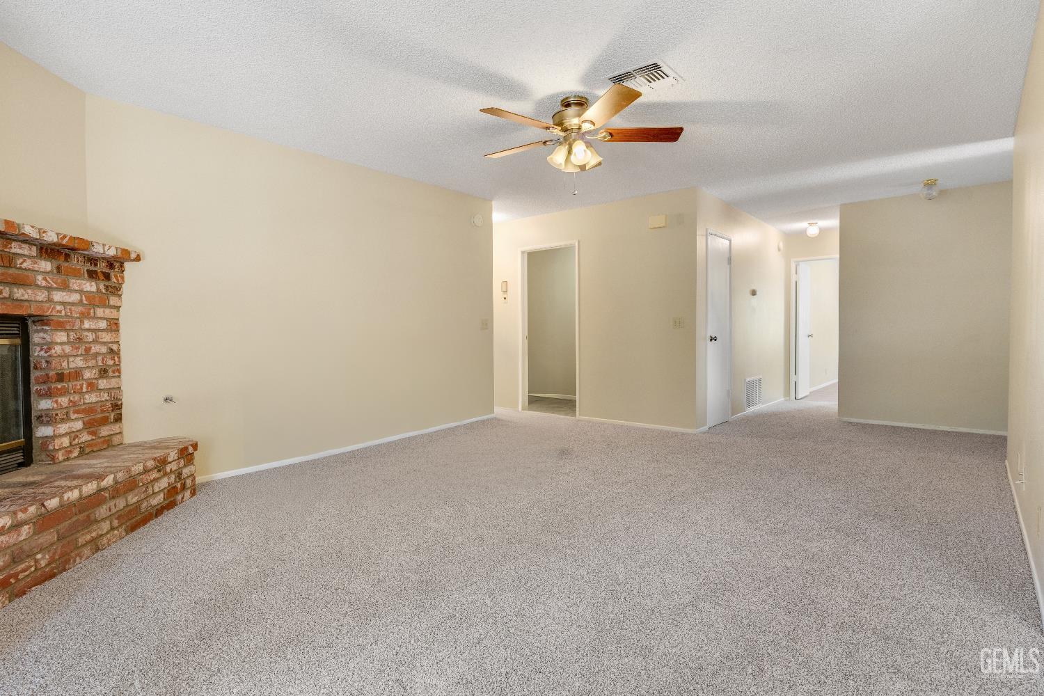Undisclosed Address Ridgecrest, CA 93555 - Photo 8 of 25 a view of an empty room with a chandelier fan