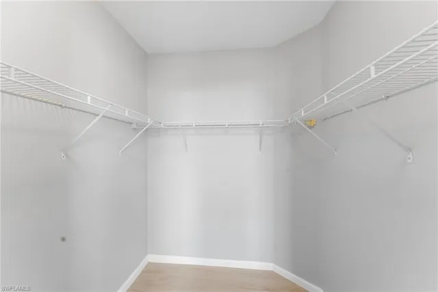 a view of an empty walk in closet