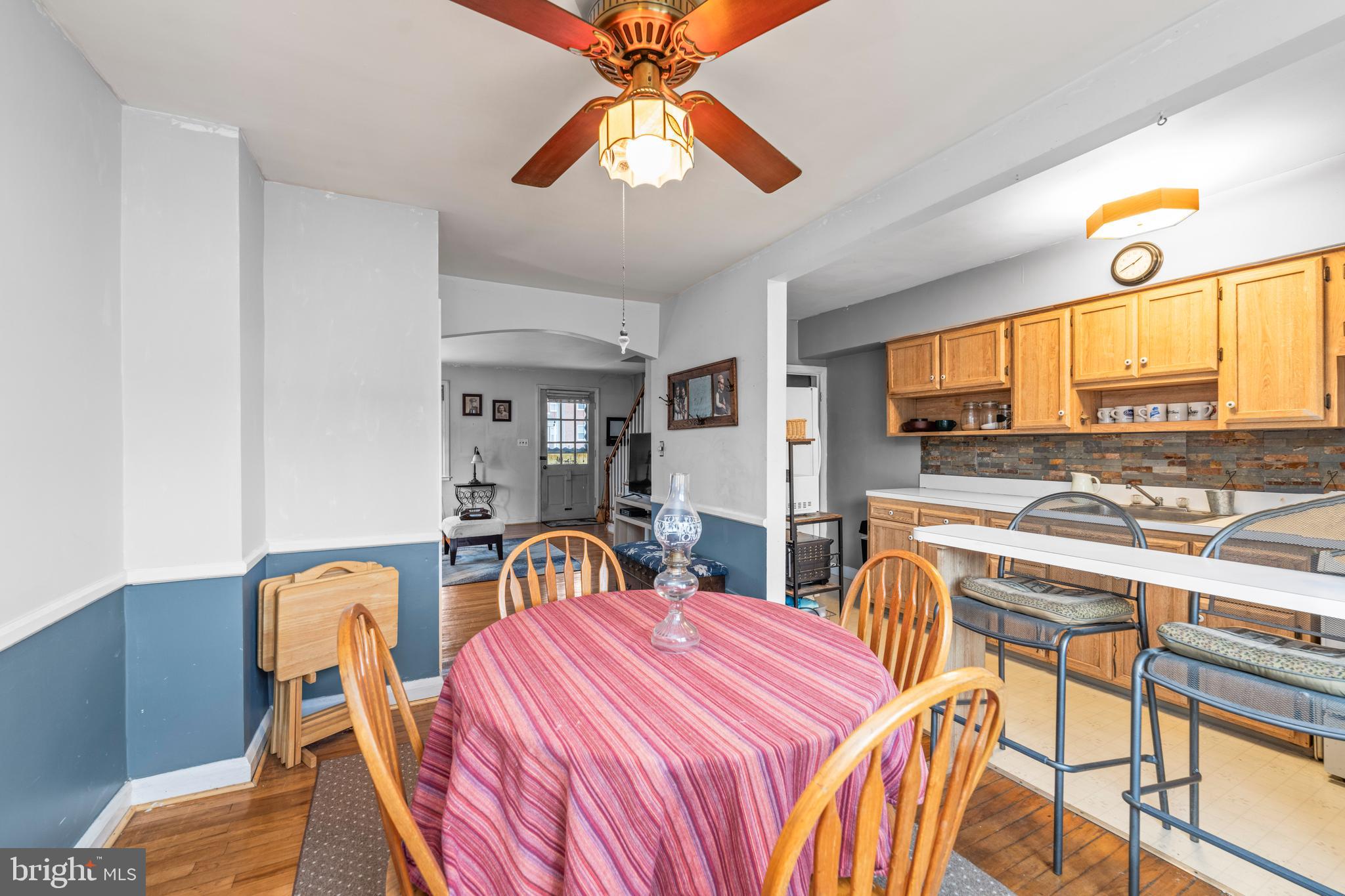 8352 Ridgely Oak Road Baltimore, MD 21234 - Photo 11 of 37 a bedroom with furniture and a large window