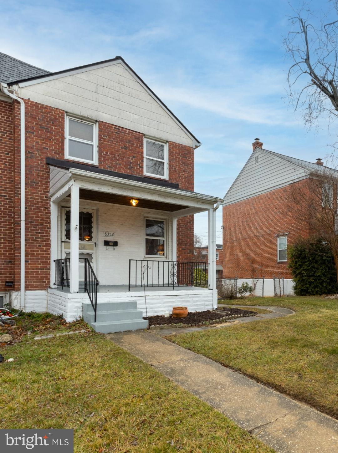 8352 Ridgely Oak Road Baltimore, MD 21234 - Photo 3 of 37 a front view of a house with garden