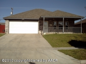 a view of a house with a porch