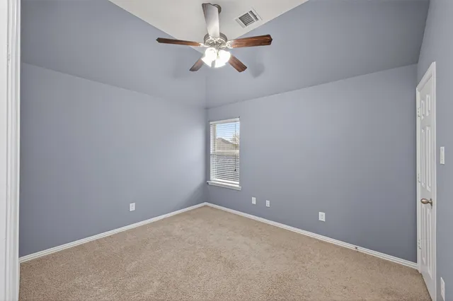 a bathroom with a sink a light fixture and a mirror