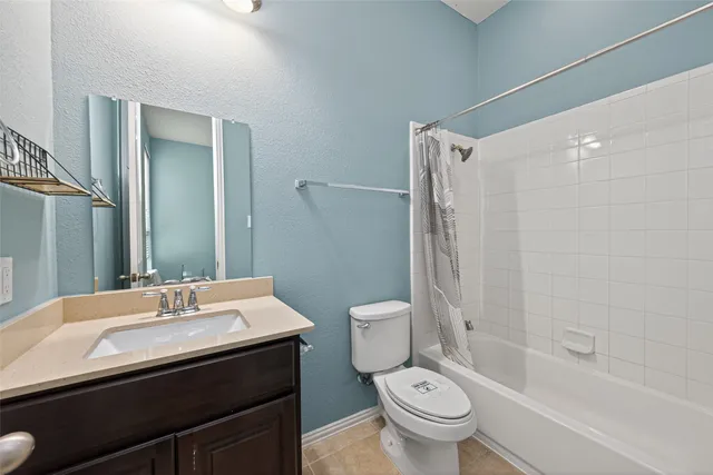 a view of backyard with a garden and deck