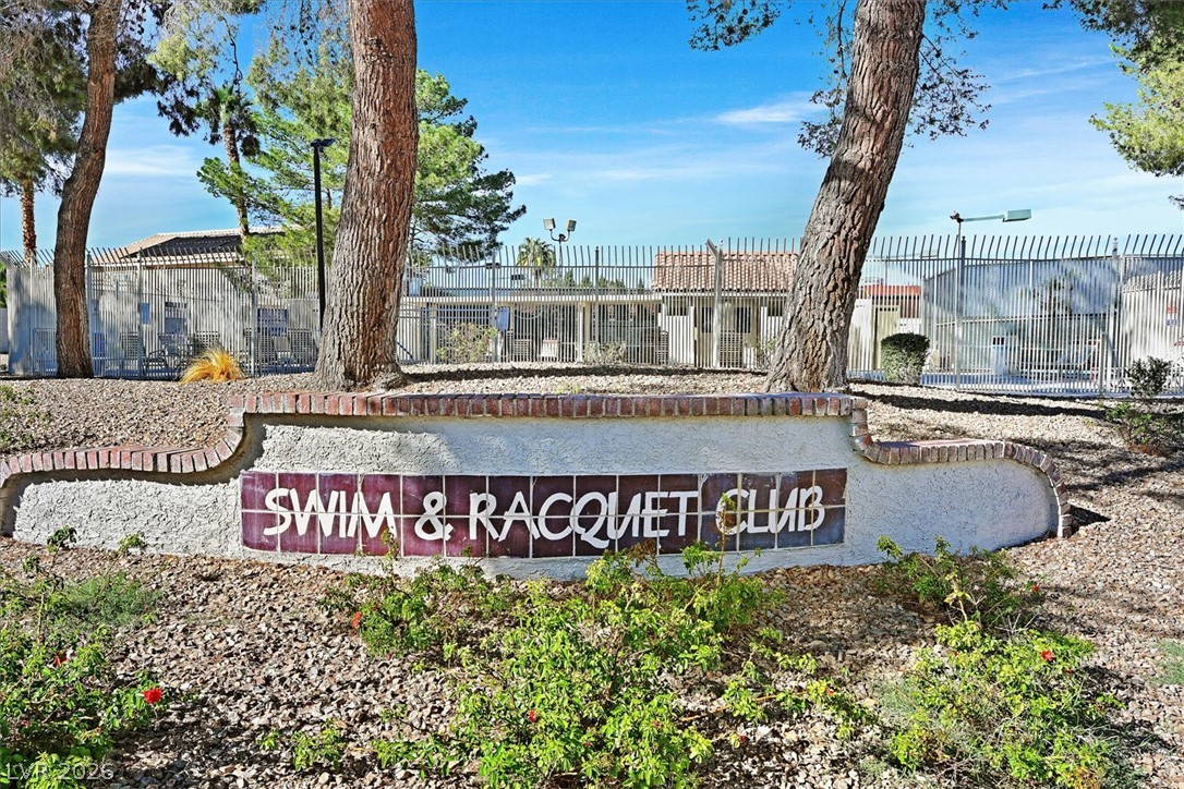 8830 Haviland Road Las Vegas, NV 89123 - Photo 42 of 43 Mature trees frame the secure gated entrance to the community recreation facilities.