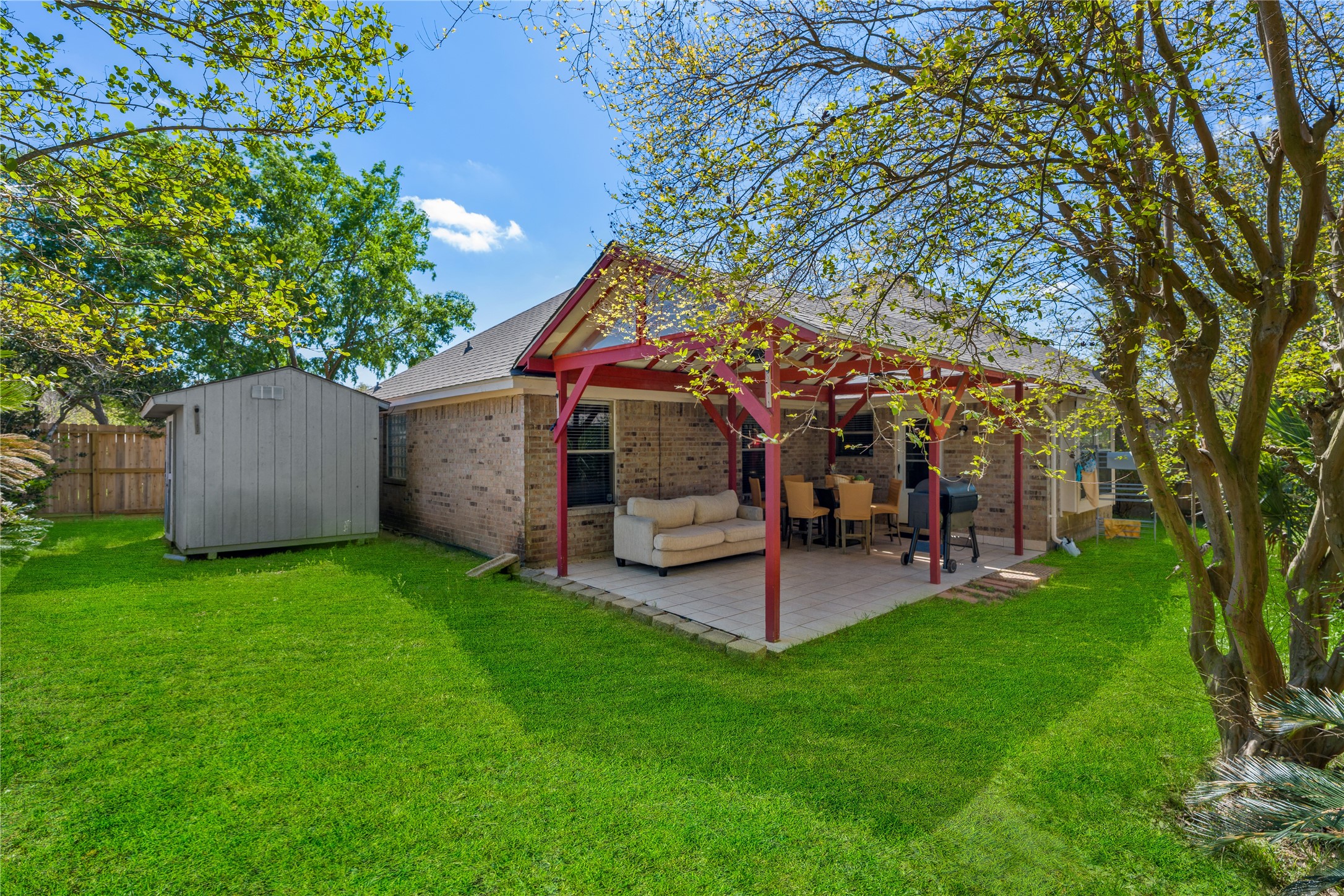 21074 Southern Colony Court Katy, TX 77449 - Photo 5 of 27 a view of a house with a backyard