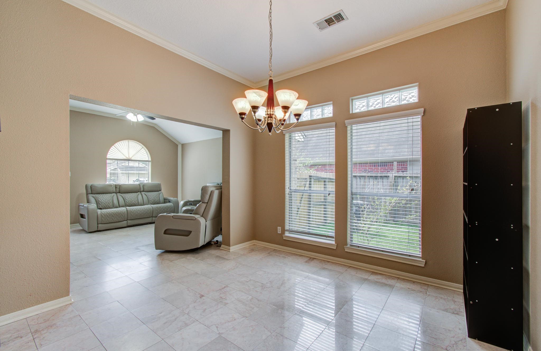 21074 Southern Colony Court Katy, TX 77449 - Photo 8 of 27 a view of a livingroom with furniture and windows