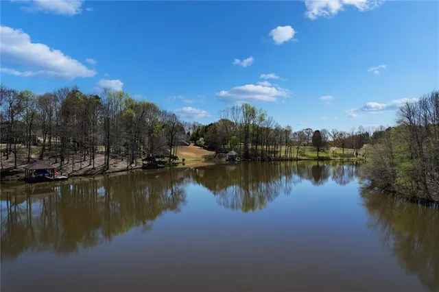 a view of a lake with a building in the background