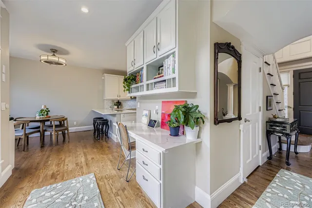 a view of living room and kitchen