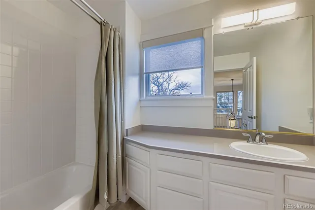 a bathroom with a sink and a bathtub
