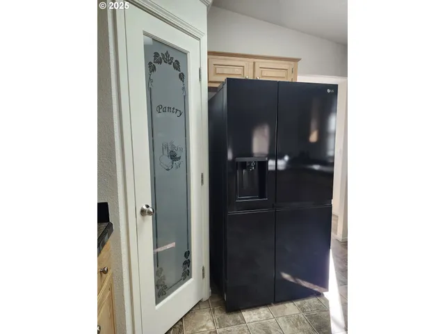 a bathroom with a shower and a sink