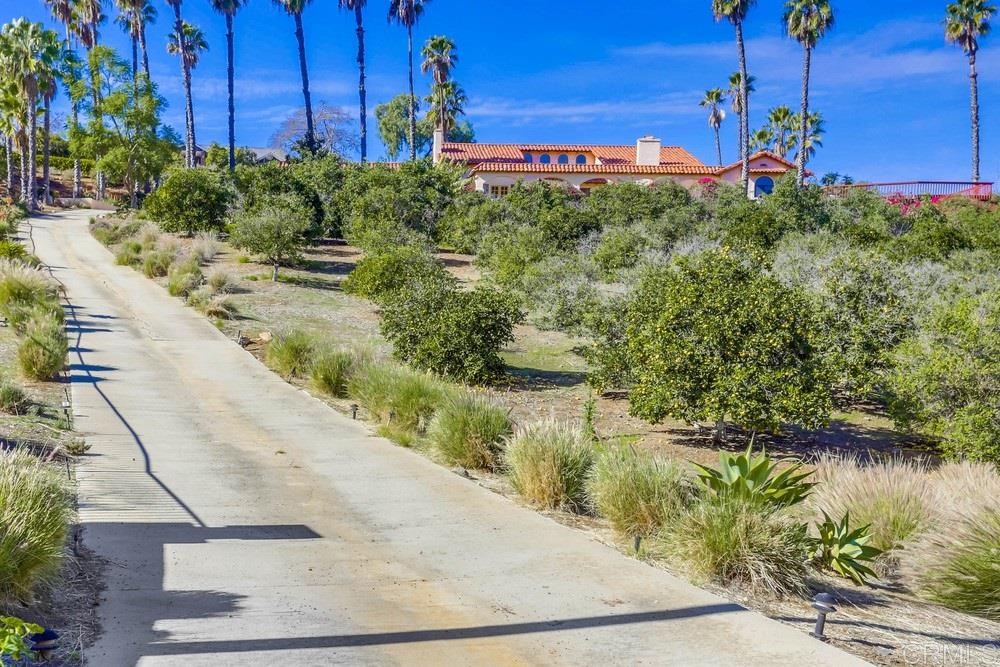 2448 Flametree Road Vista, CA 92084 - Photo 1 of 1 a view of a pathway both side of building