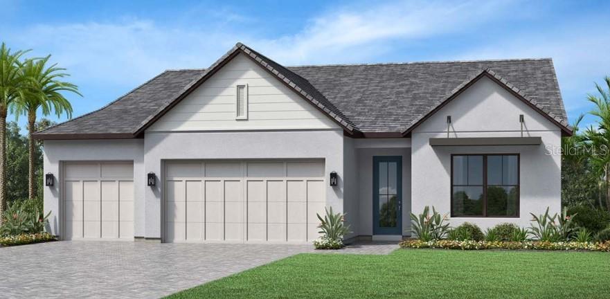 a front view of a house with a yard and plants