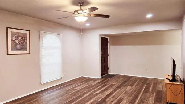 a view of a room with a flat screen tv