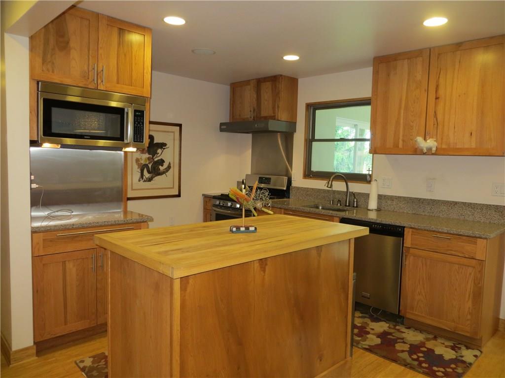 128 Upper Service Road Hookstown, PA 15050 - Photo 2 of 19 Hickory Kitchen w/Quartz Counters, Top of the Line SS Appliances, and Moveable Island w/Butcher Block Counter.