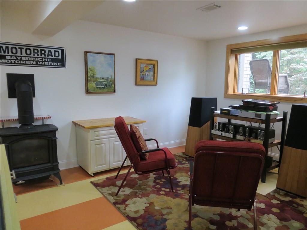 128 Upper Service Road Hookstown, PA 15050 - Photo 15 of 19 Family Room in Lower Level w/Gas Stove for extra warmth.