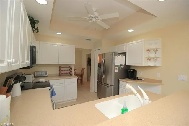a bathroom with a double vanity sink and mirror