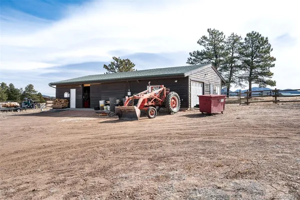 a view of a terrace with sitting area