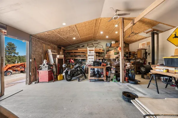 a bedroom with a bed and a table