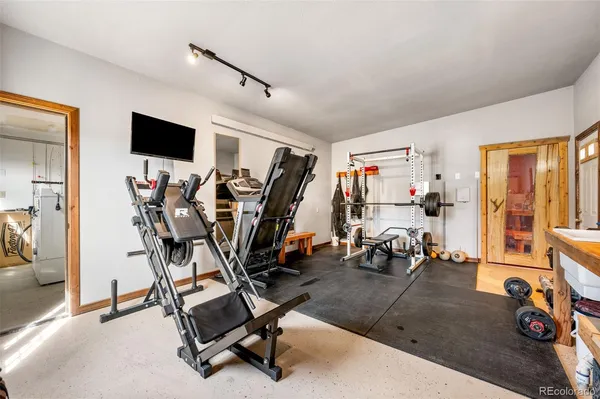 a view of a room with gym equipment