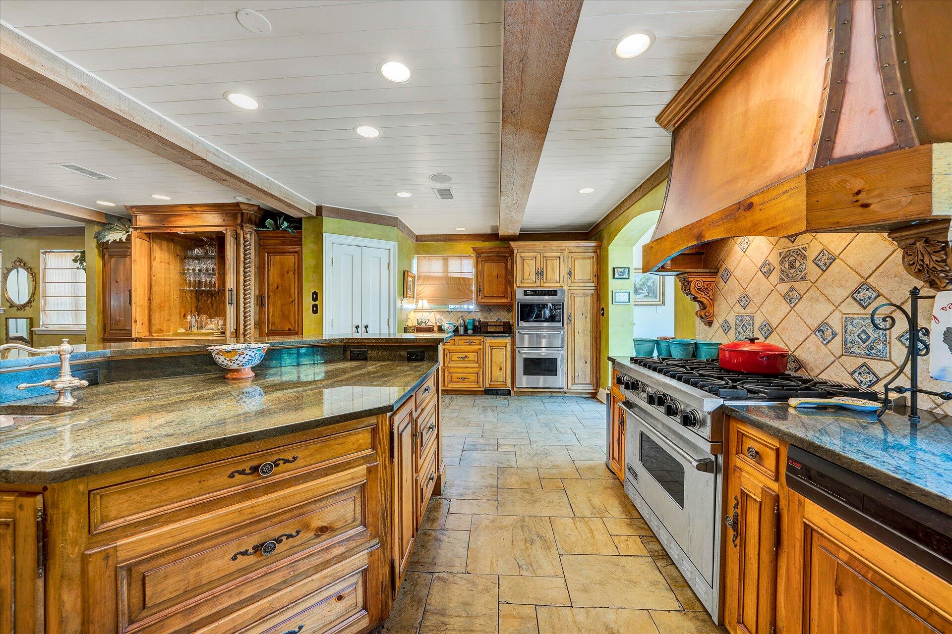 15 Cardinal Road Southeast Roanoke, VA 24014 - Photo 45 of 95 a kitchen with stainless steel appliances granite countertop a stove and a sink