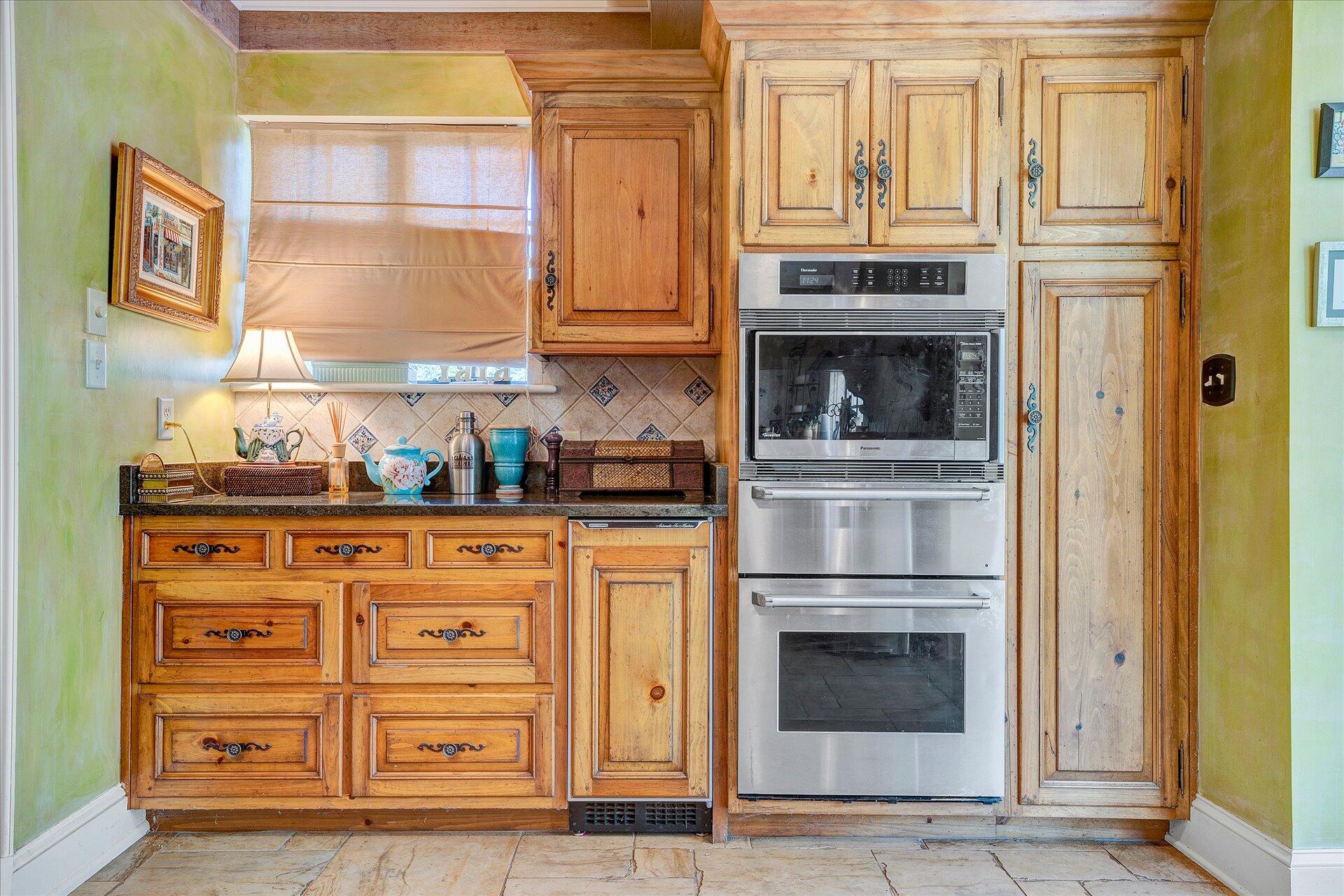 15 Cardinal Road Southeast Roanoke, VA 24014 - Photo 47 of 95 a kitchen with stainless steel appliances granite countertop a refrigerator and cabinets