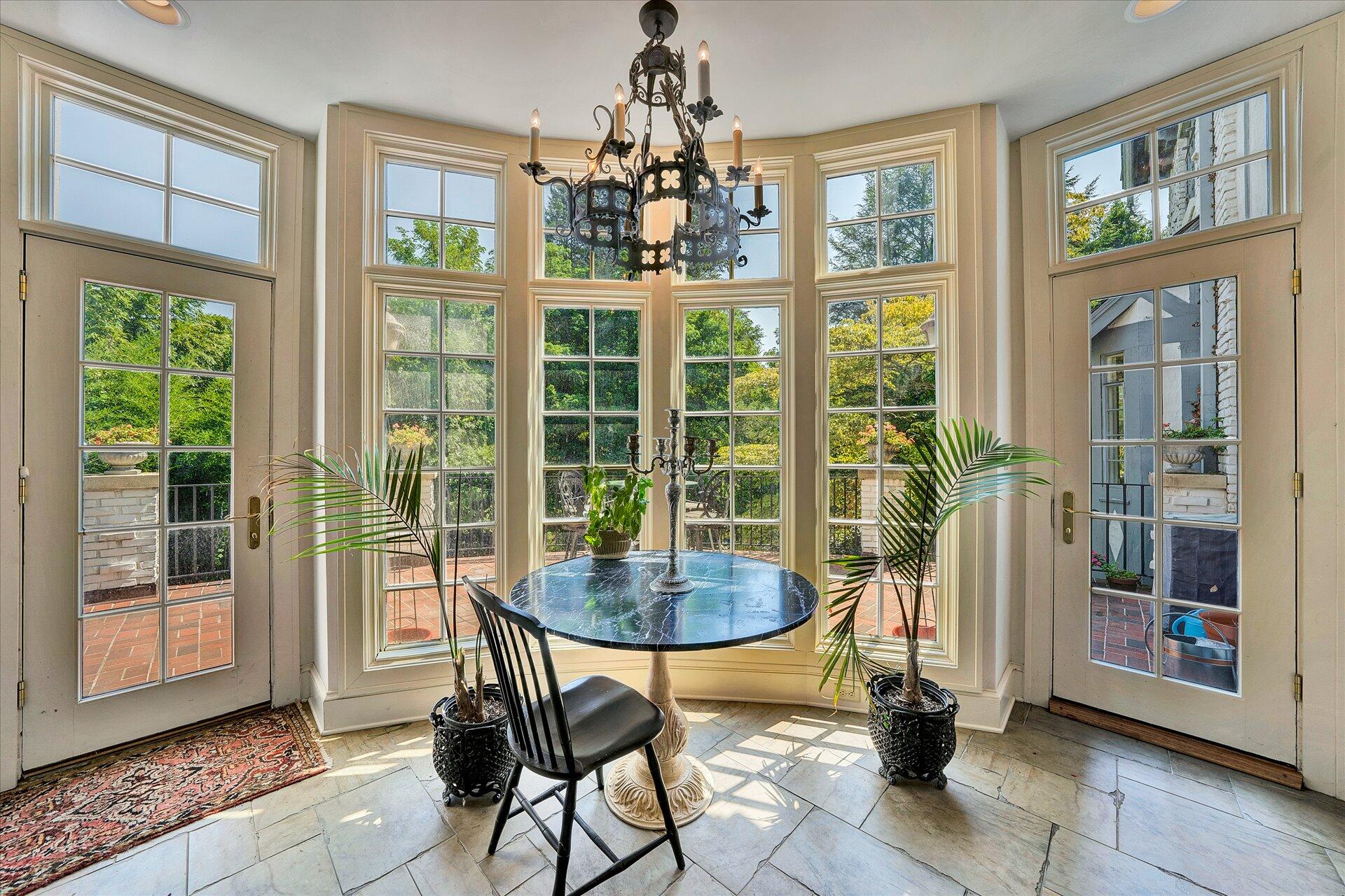 15 Cardinal Road Southeast Roanoke, VA 24014 - Photo 52 of 95 a dining room with wooden floor and a chandelier