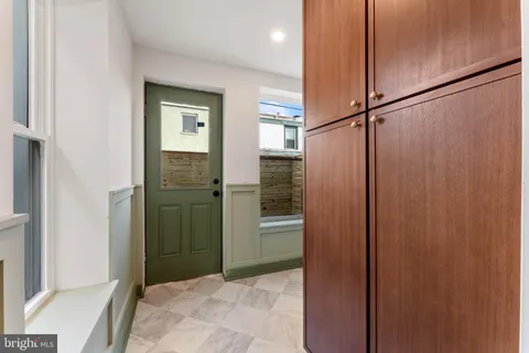 a bathroom with a shower and a sink