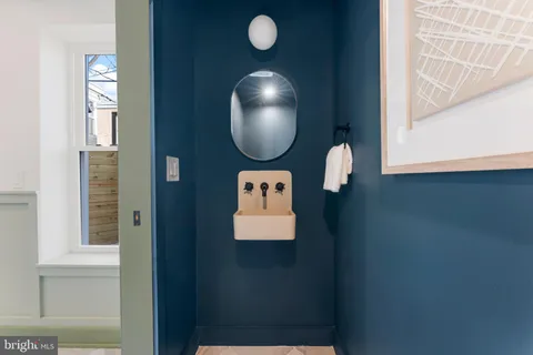 a view of staircase with a chair