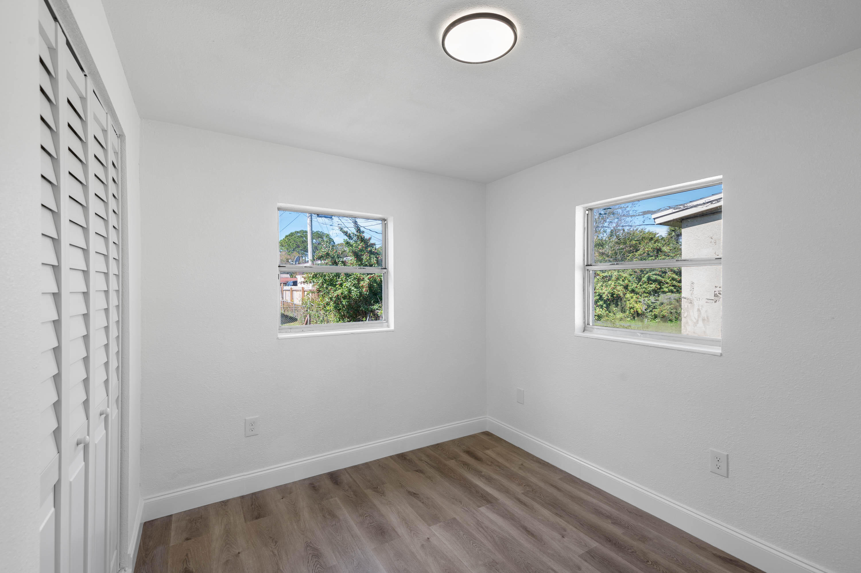 515 A Lane Cocoa, FL 32926 - Photo 18 of 31 an empty room with windows