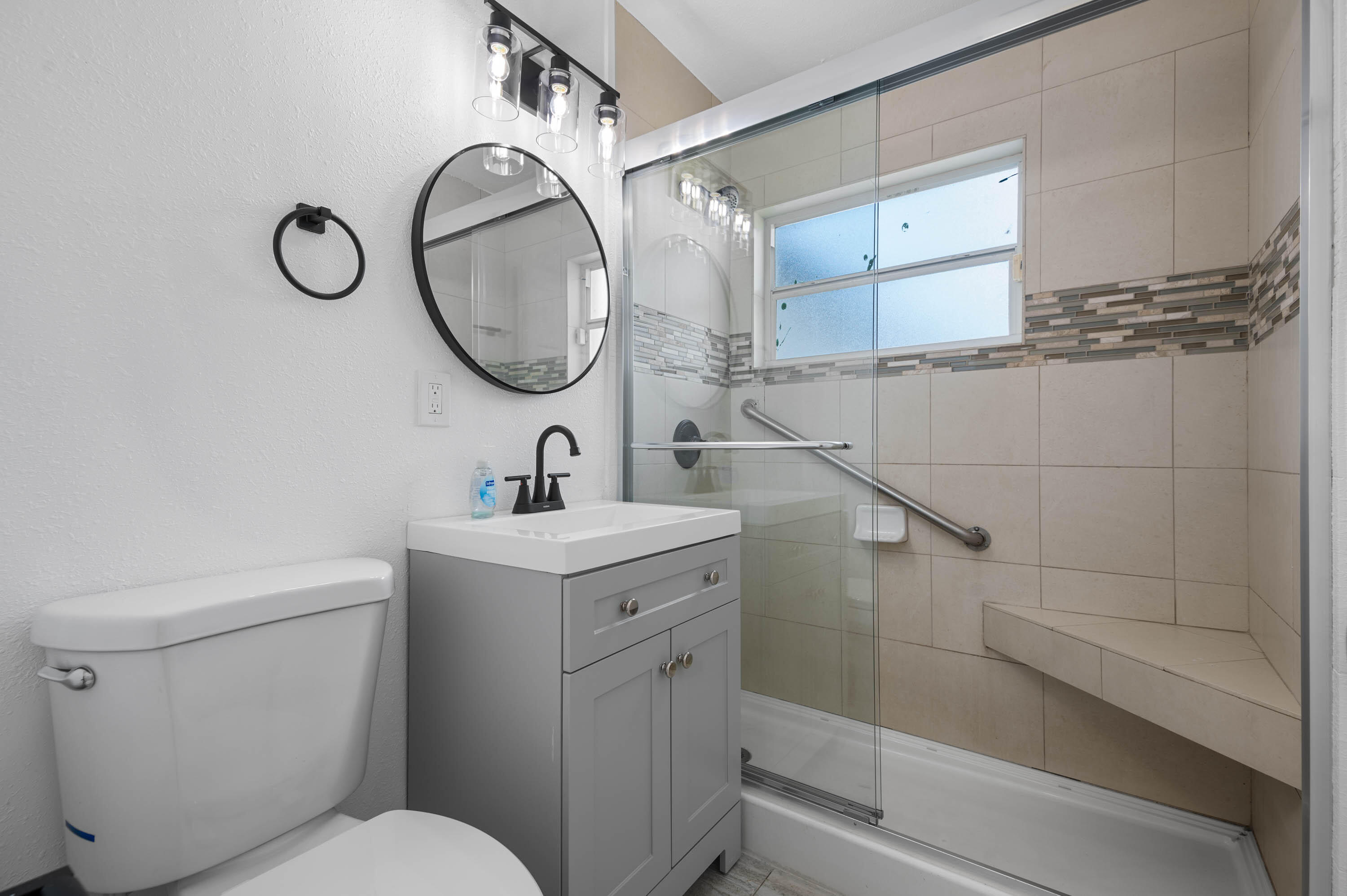 515 A Lane Cocoa, FL 32926 - Photo 19 of 31 a bathroom with a toilet sink and tub