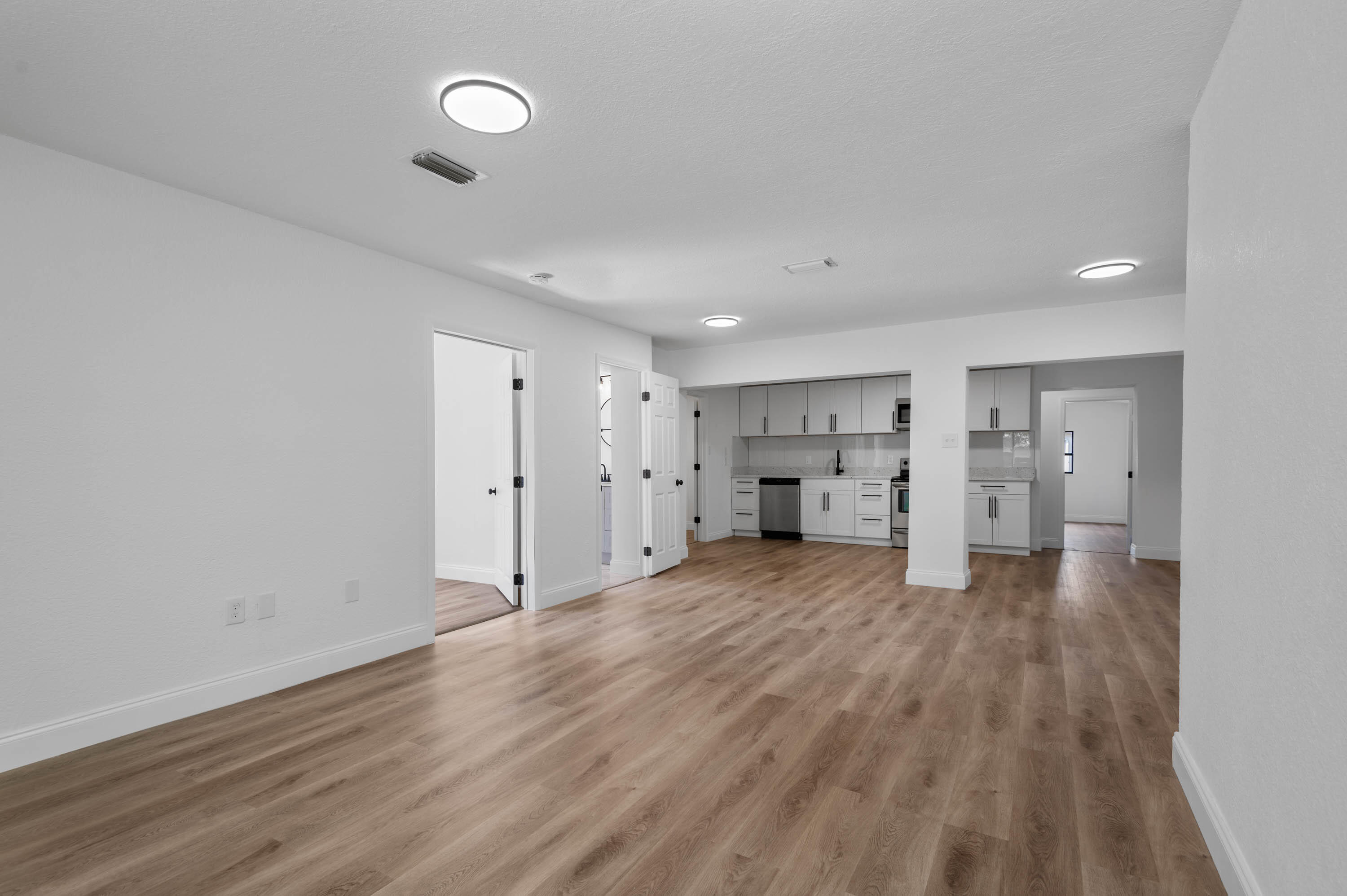 515 A Lane Cocoa, FL 32926 - Photo 6 of 31 a view of empty room with wooden floor