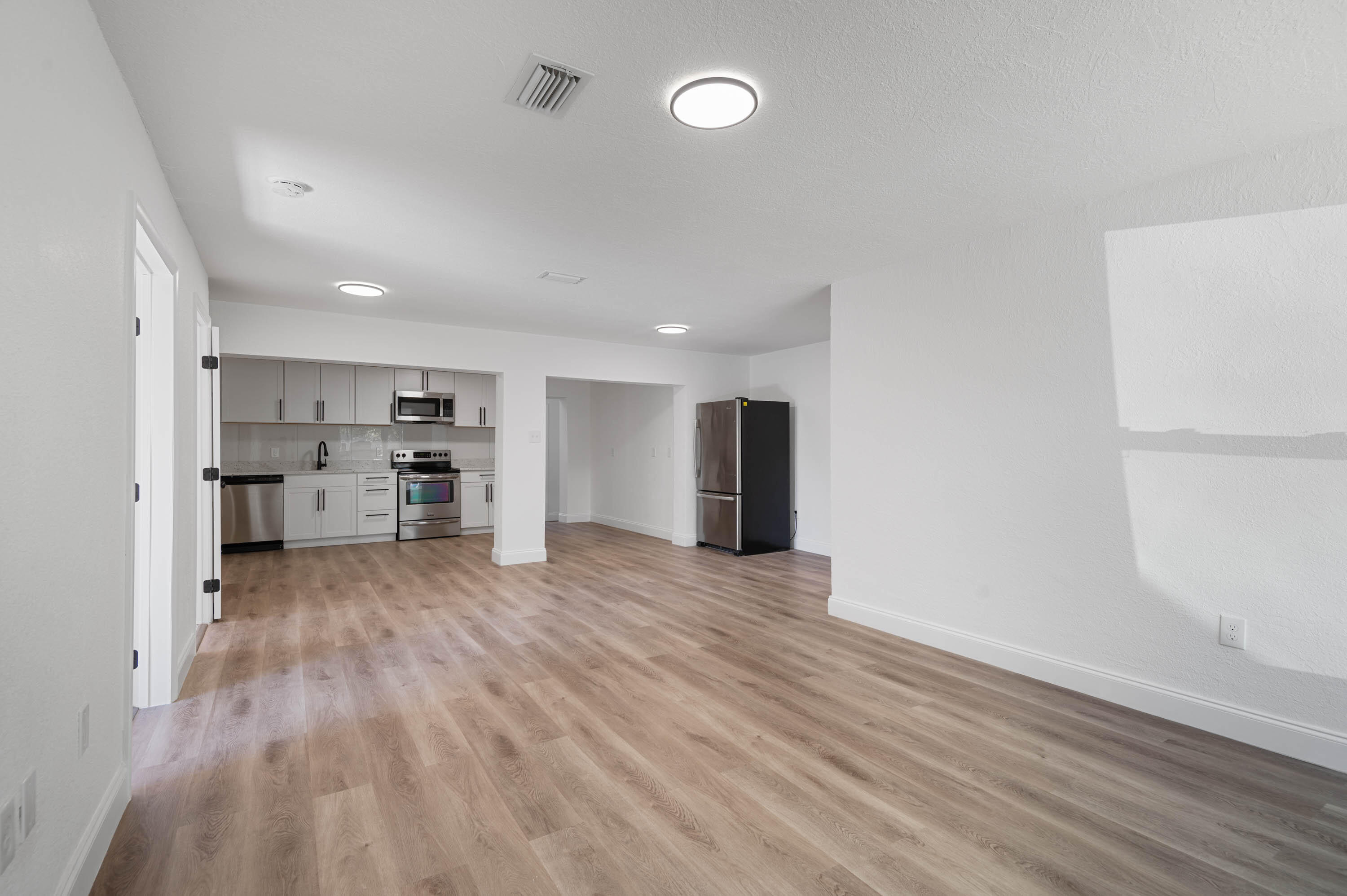 515 A Lane Cocoa, FL 32926 - Photo 10 of 31 a view of kitchen with wooden floor