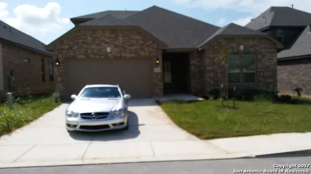 a car parked in front of a house
