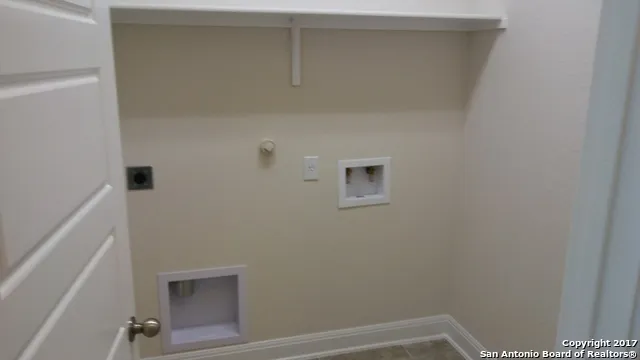 a view of small space with racks on the wall