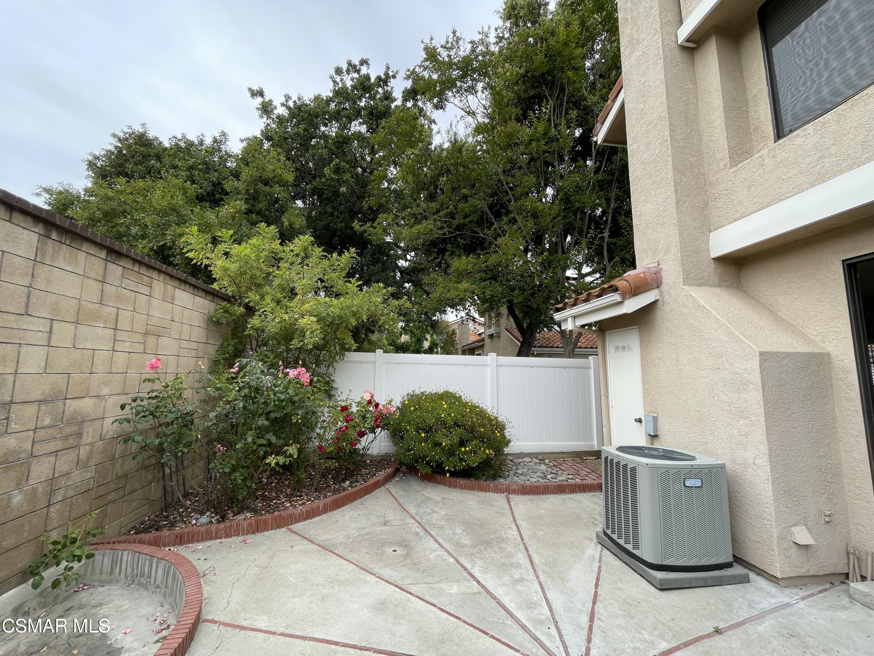 429 Dante Way Oak Park, CA 91377 - Photo 18 of 18 a view of a street with potted plants