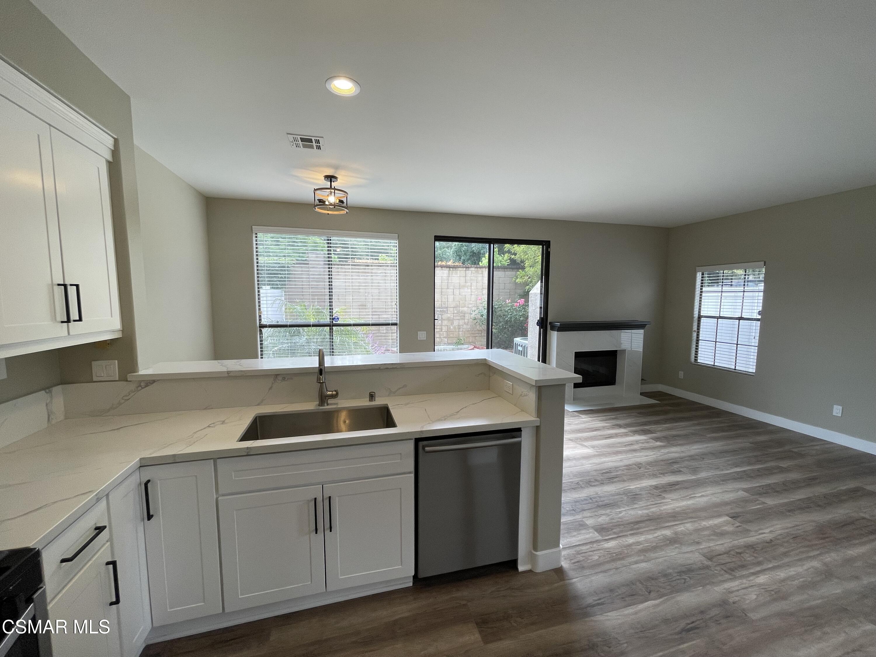 429 Dante Way Oak Park, CA 91377 - Photo 7 of 18 a kitchen with sink and window