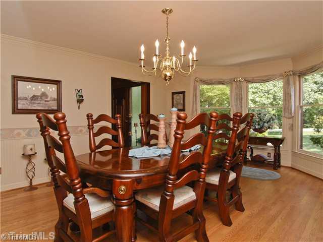 6102 Pintail Court Oak Ridge, NC 27310 - Photo 11 of 16 Dining Room. Spacious Dining Room with bay window is perfect for family gatherings.