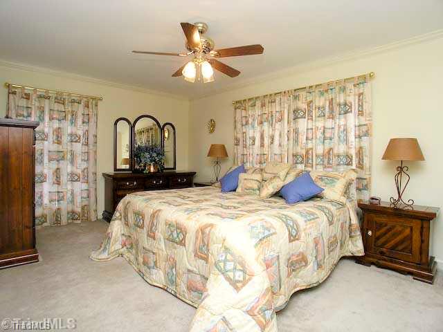 6102 Pintail Court Oak Ridge, NC 27310 - Photo 14 of 16 3rd Bedroom. Spacious third bedroom (17 -2" x 11 -6").