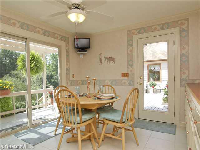 6102 Pintail Court Oak Ridge, NC 27310 - Photo 10 of 16 Breakfast. The breakfast area is a great place to spend reading the paper and sipping your favorite drink while enjoying the outside inside.