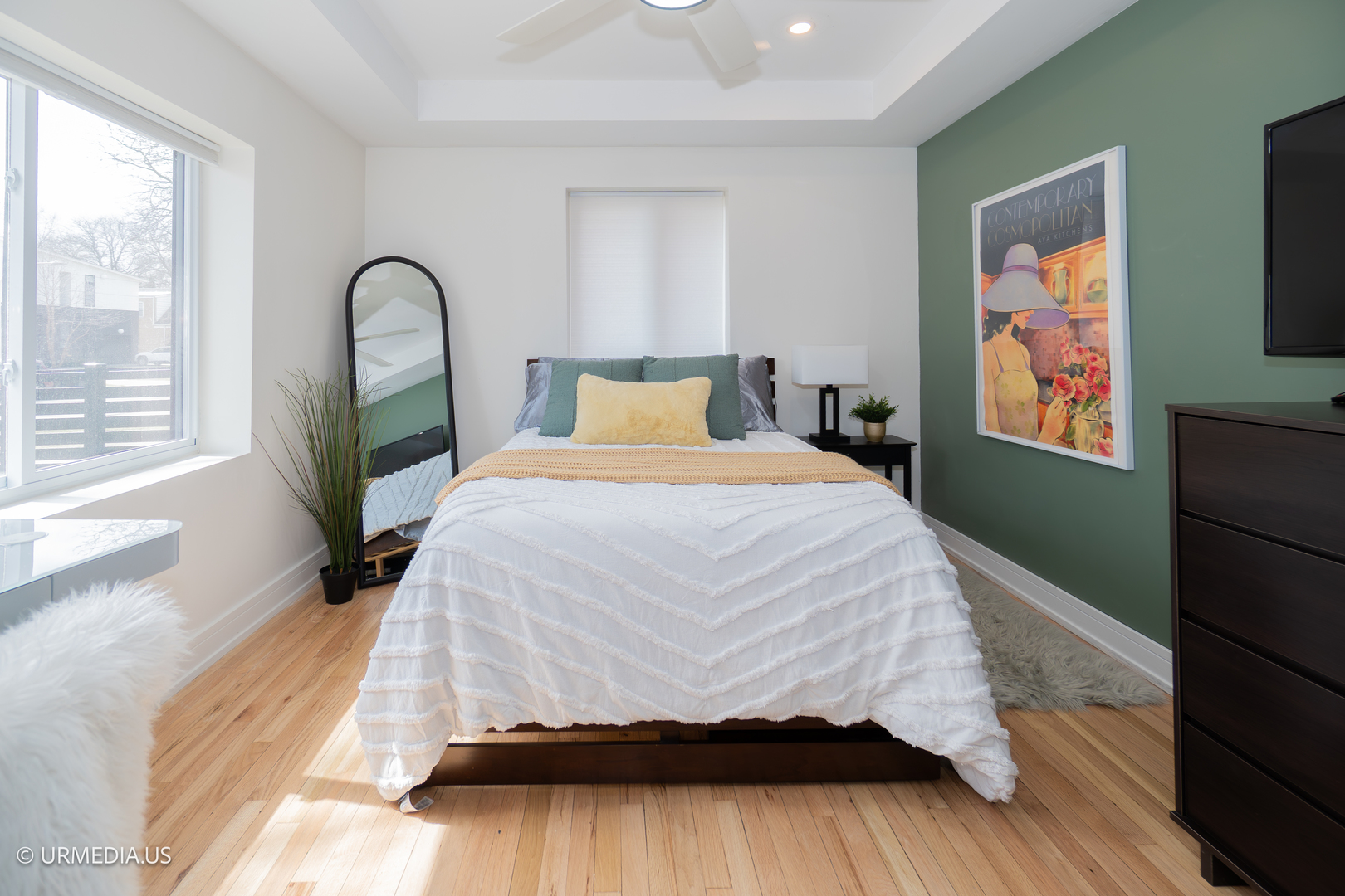 7100 North Sioux Avenue Chicago, IL 60646 - Photo 36 of 49 a bedroom with a bed and a large window