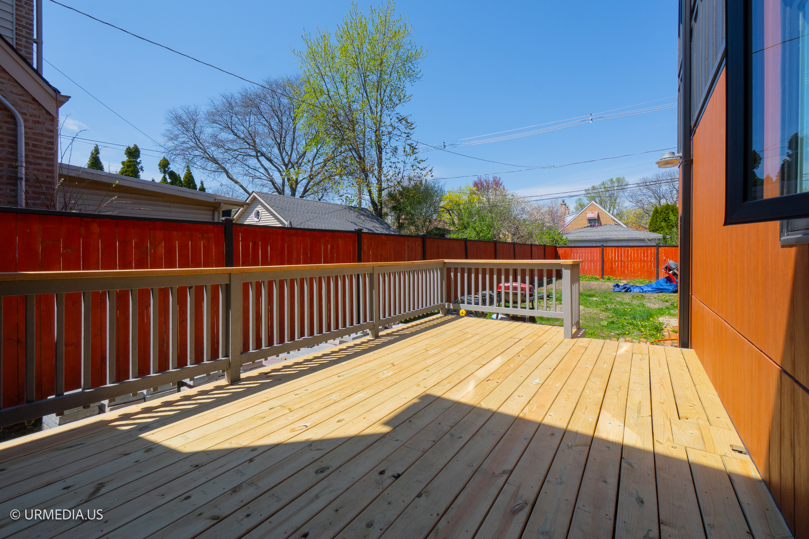 7100 North Sioux Avenue Chicago, IL 60646 - Photo 45 of 49 a view of balcony with wooden floor and fence