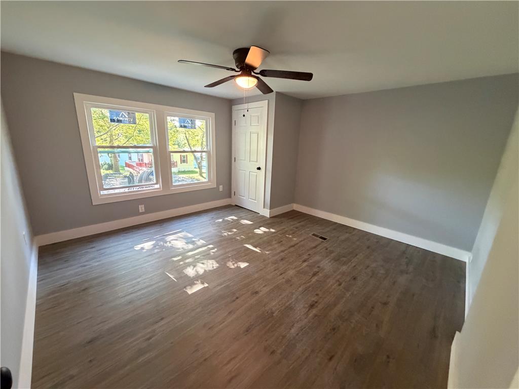 19 Springridge Road Bath, PA 18014 - Photo 21 of 29 Gleaming wood-look floors anchor this versatile room illuminated by double double-hung windows.