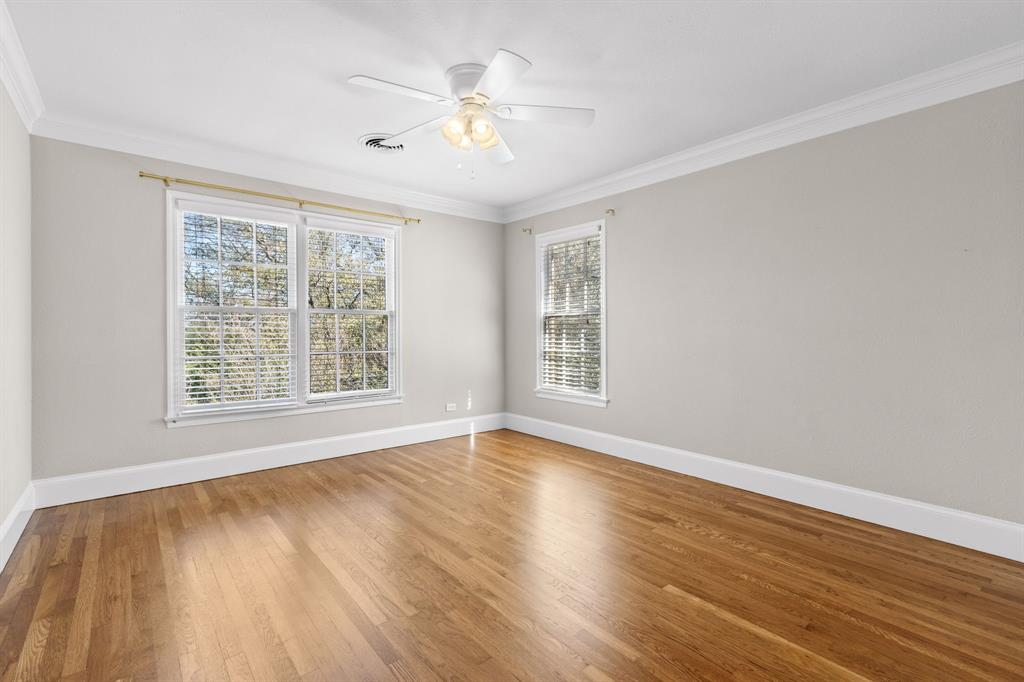 2815 Cumberland Avenue Waco, TX 76708 - Photo 28 of 40 a view of an empty room with wooden floor and a window