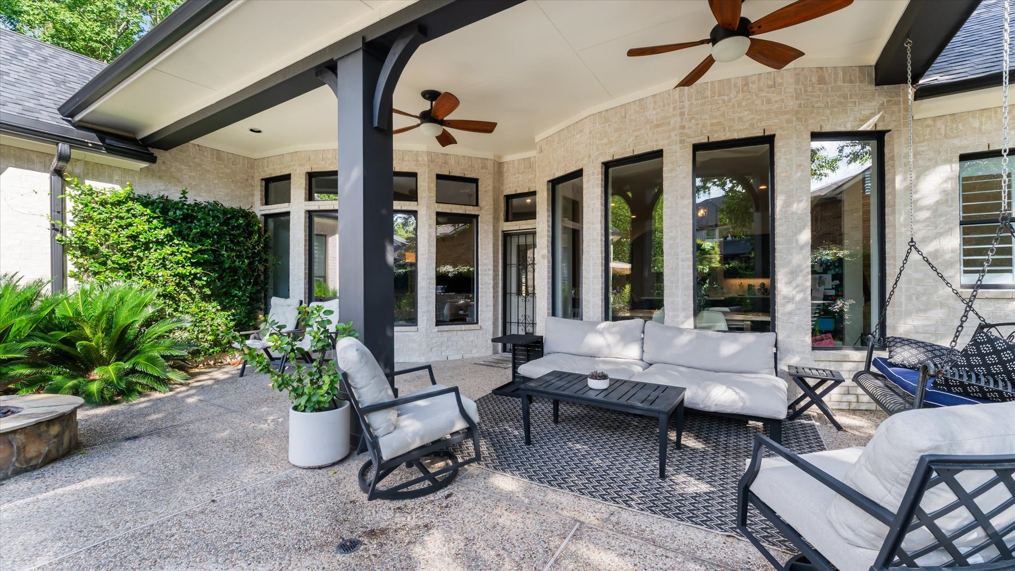 2 South Winsome Path Circle Spring, TX 77382 - Photo 40 of 47 a building outdoor space with patio furniture and potted plants