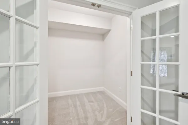 a view of an empty walk in closet
