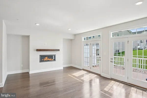 a view of livingroom with furniture wooden floor and window