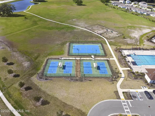 a view of swimming pool with seating area