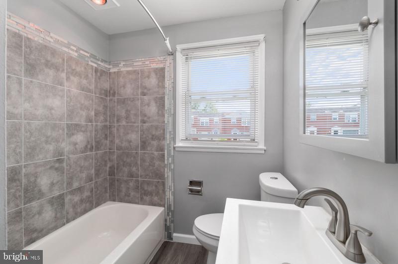 5460 Whitwood Road Baltimore, MD 21206 - Photo 24 of 37 New Flooring, New Tiles, Heat Lamp