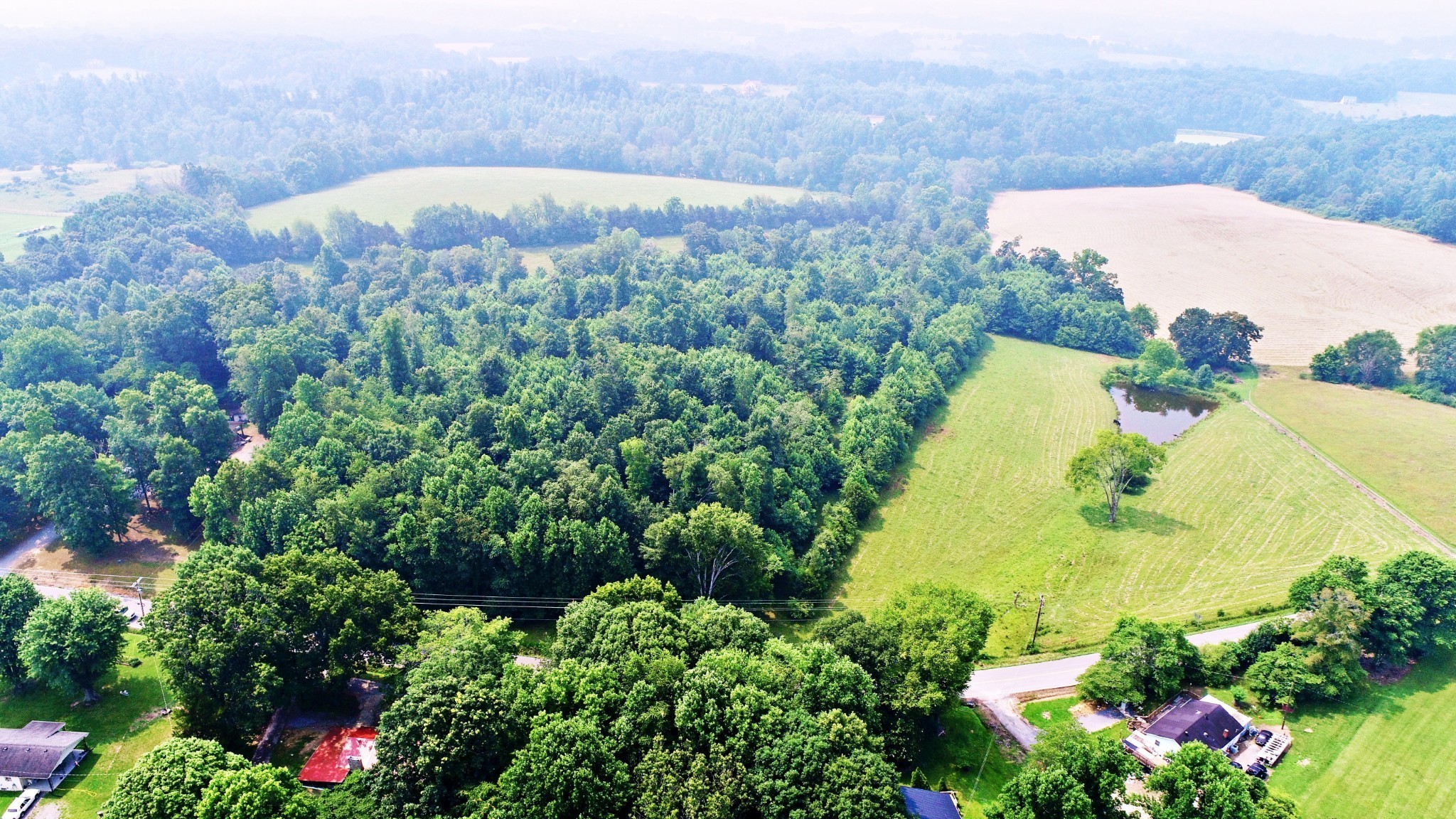 4 Celina Road Red Boiling Springs, TN 37150 - Photo 11 of 16 an aerial view of a house with a garden and a yard